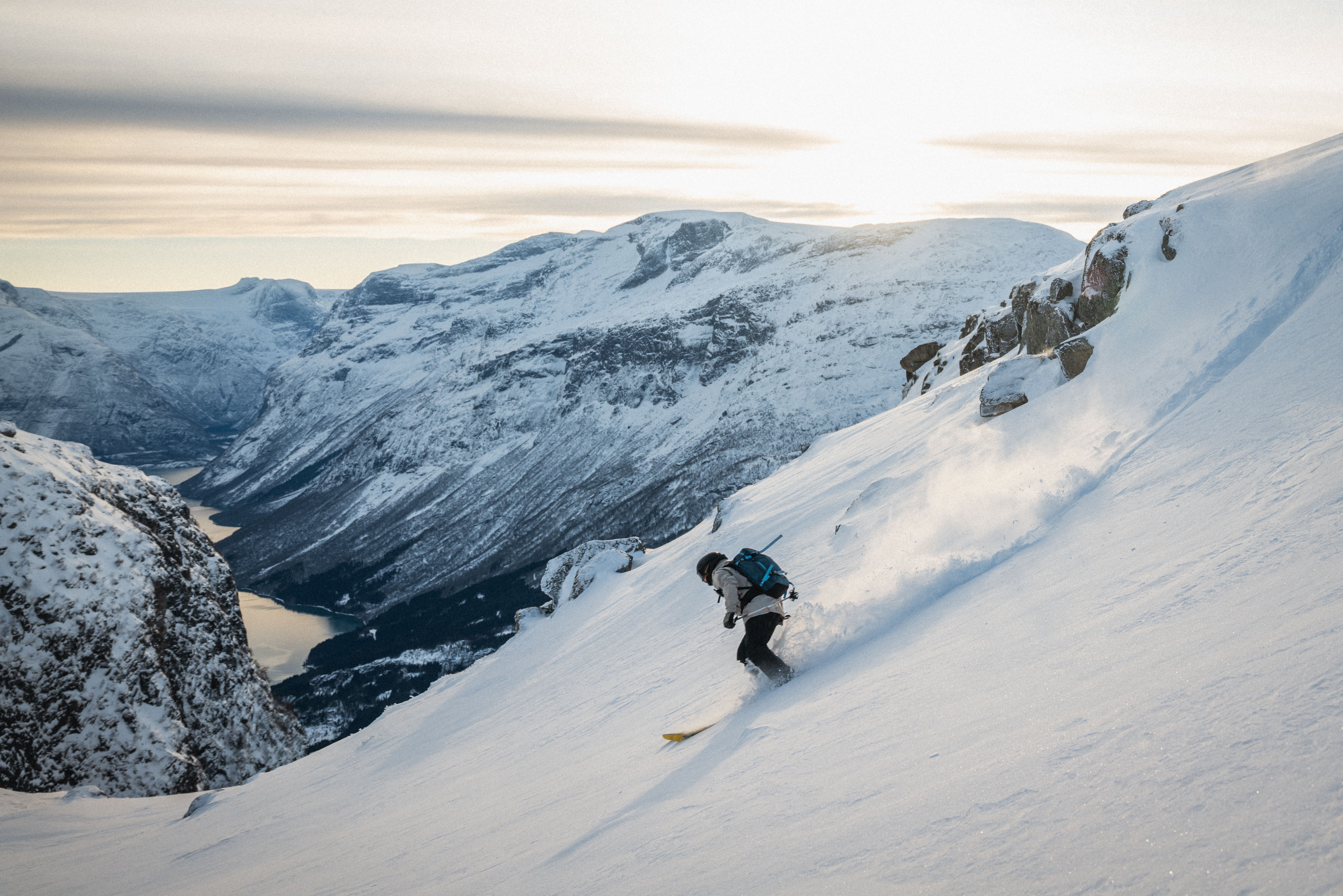 A person skiing down a mountain.