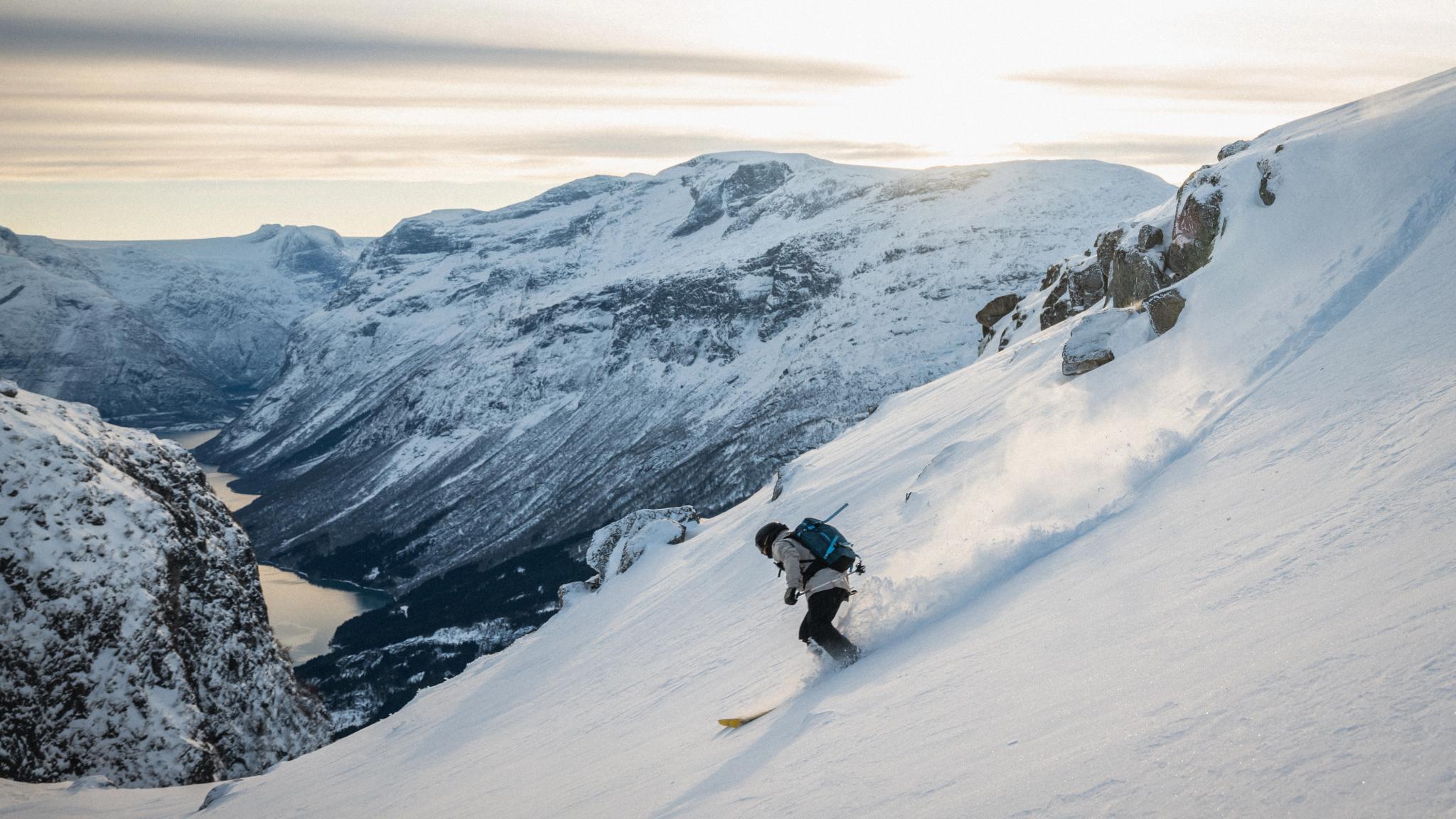 A person skiing down a mountain.