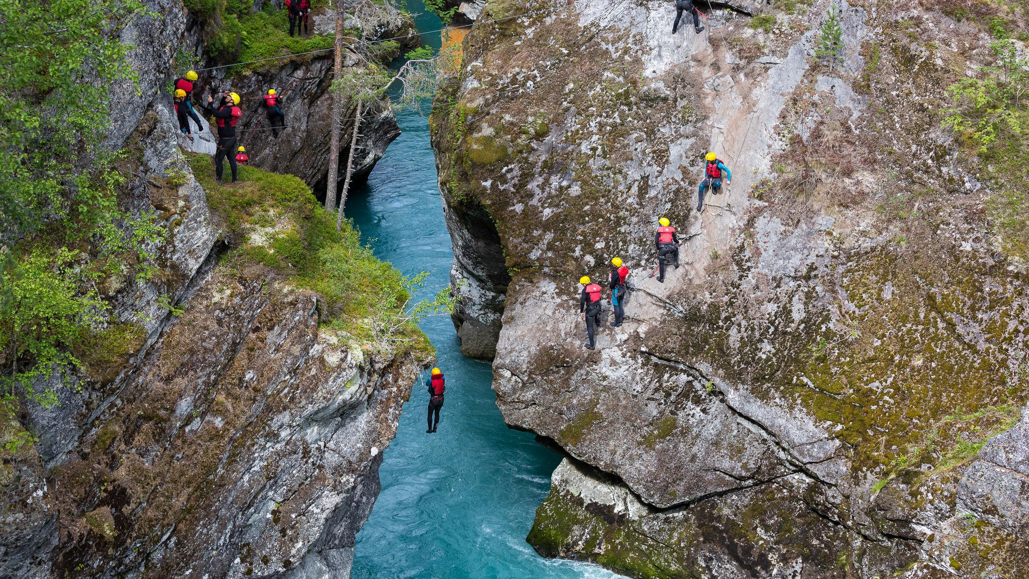 People canyoning in Valldal in Møre og Romsdal in Fjord Norway