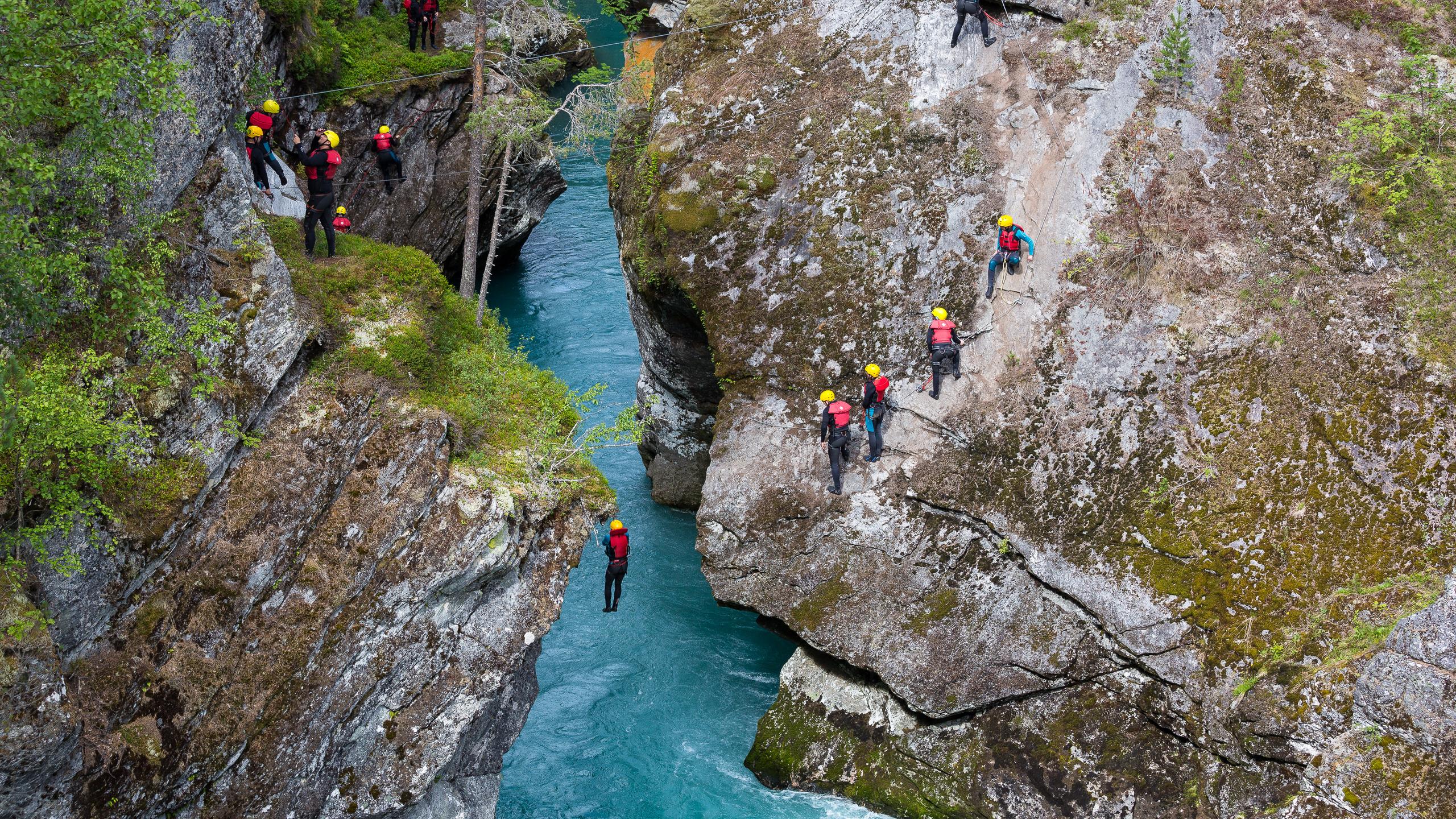 People canyoning in Valldal in Møre og Romsdal in Fjord Norway