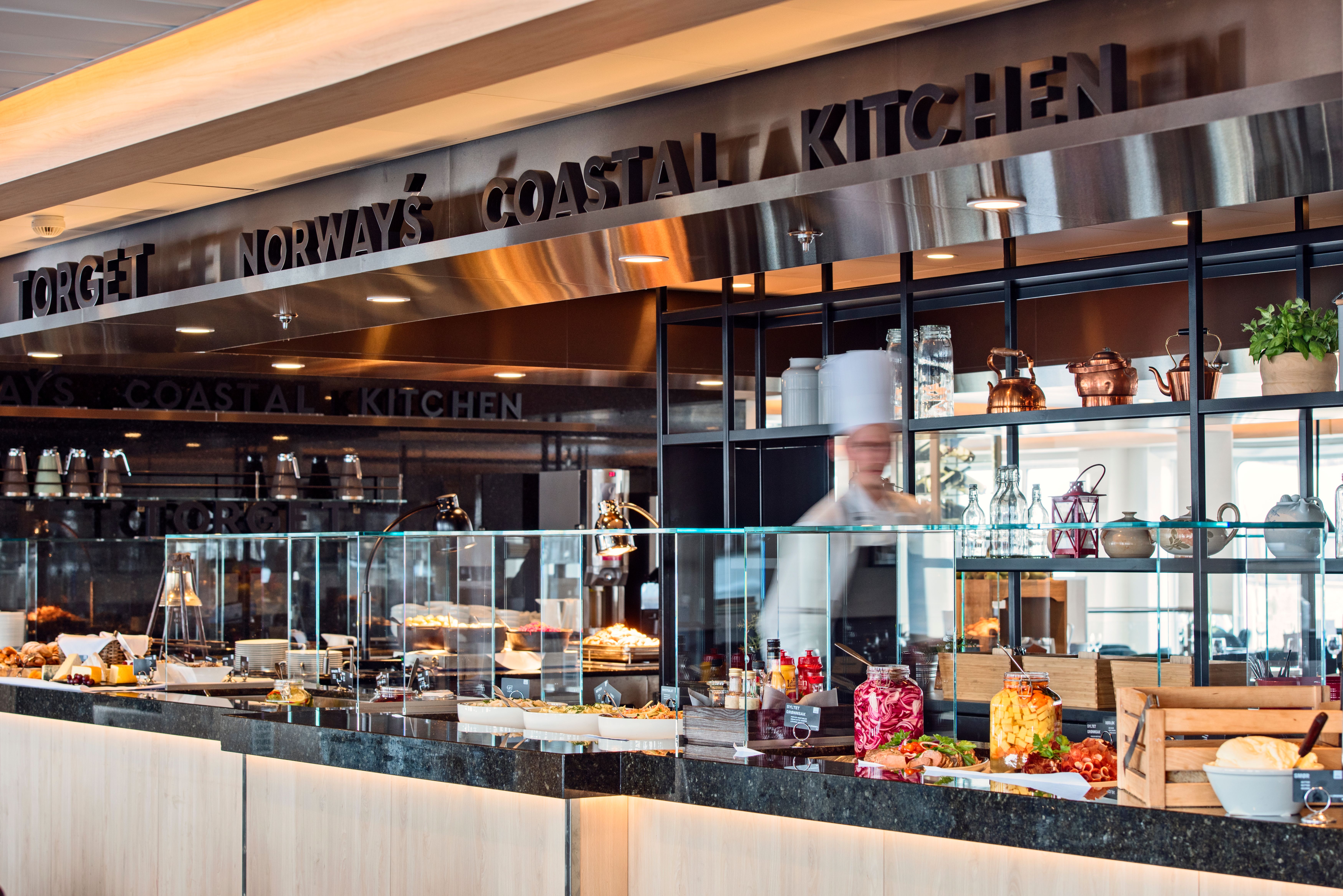 A chef preparing a buffet on Hurtigruten