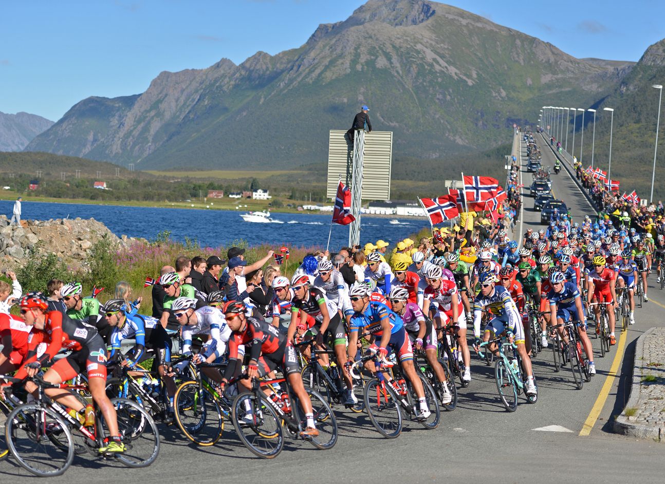 The peleton in the Arctic Race of Norway cycling over the Sortland bridge in Vesterålan, Northern Norway