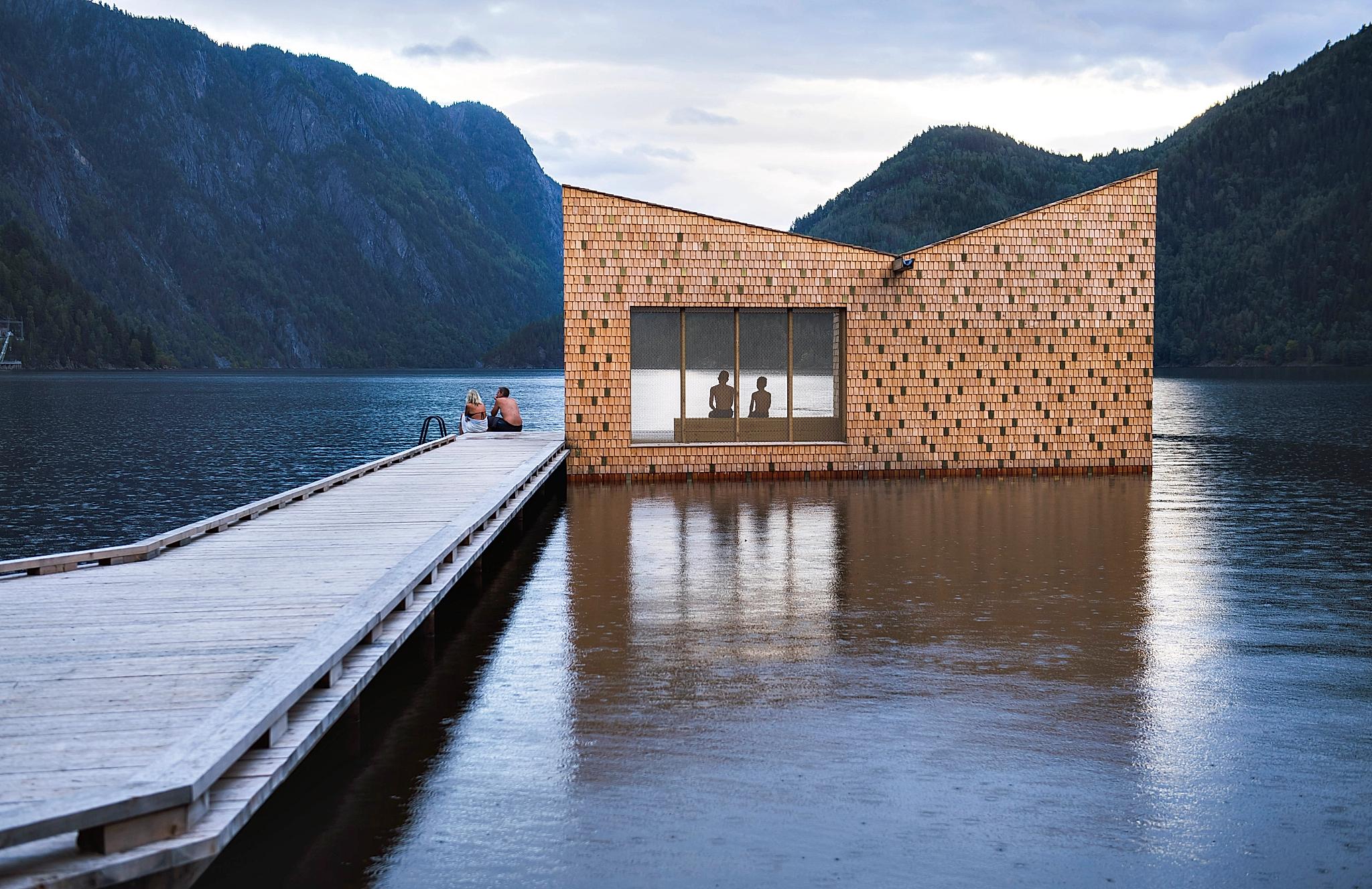 People enjoying the floating Soria Moria sauna in Telemark