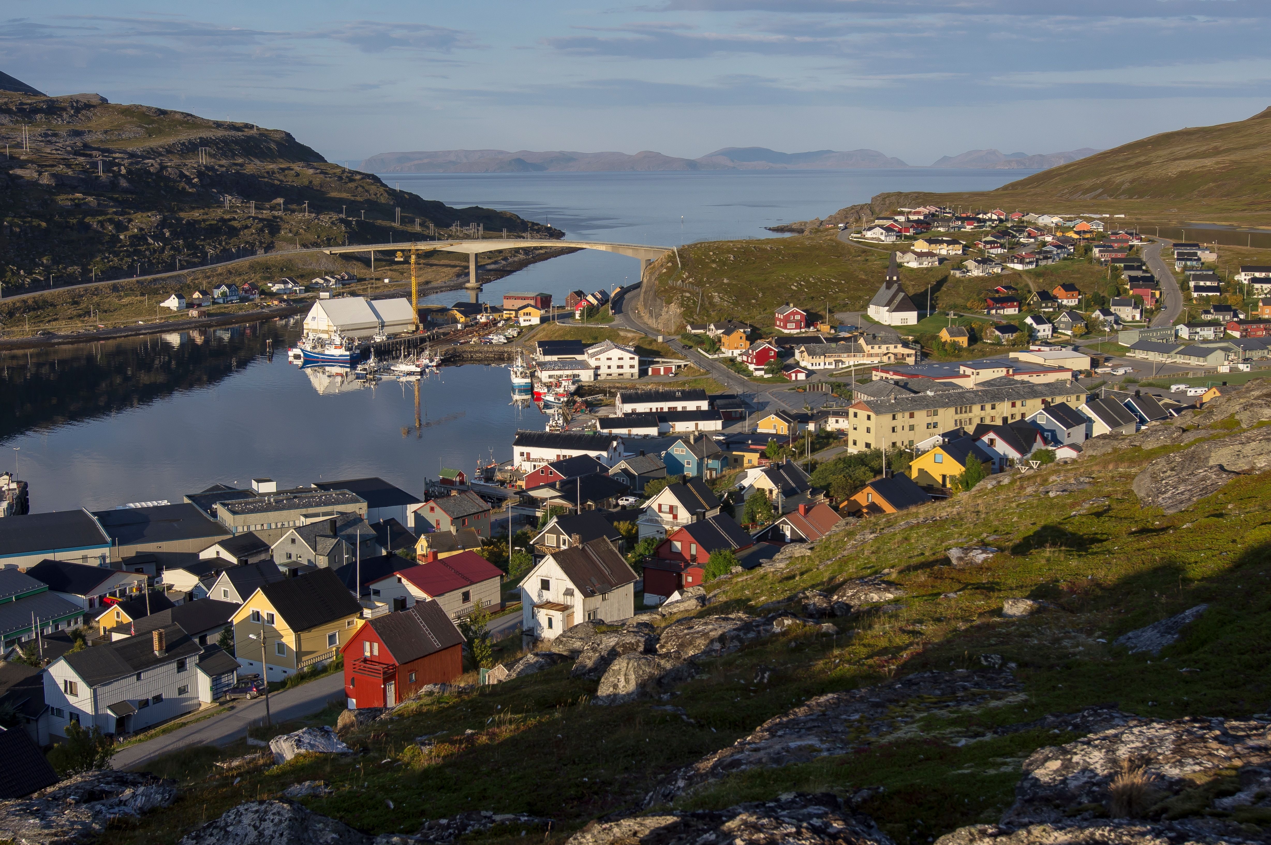 View of Havøysund village with houses along the coastline