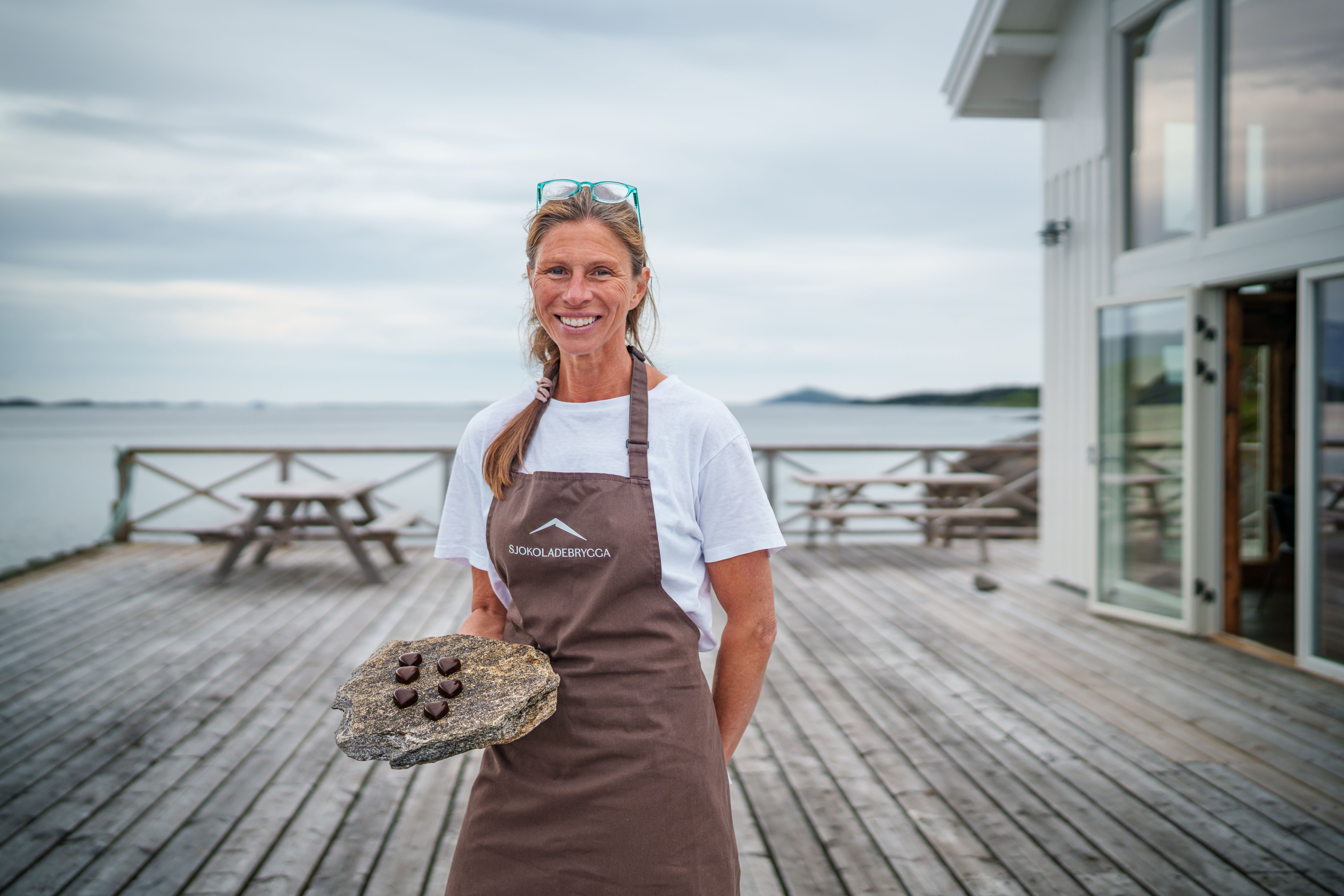 A woman at Sjokoladebrygga chocolate factory at Dønna in Helgeland