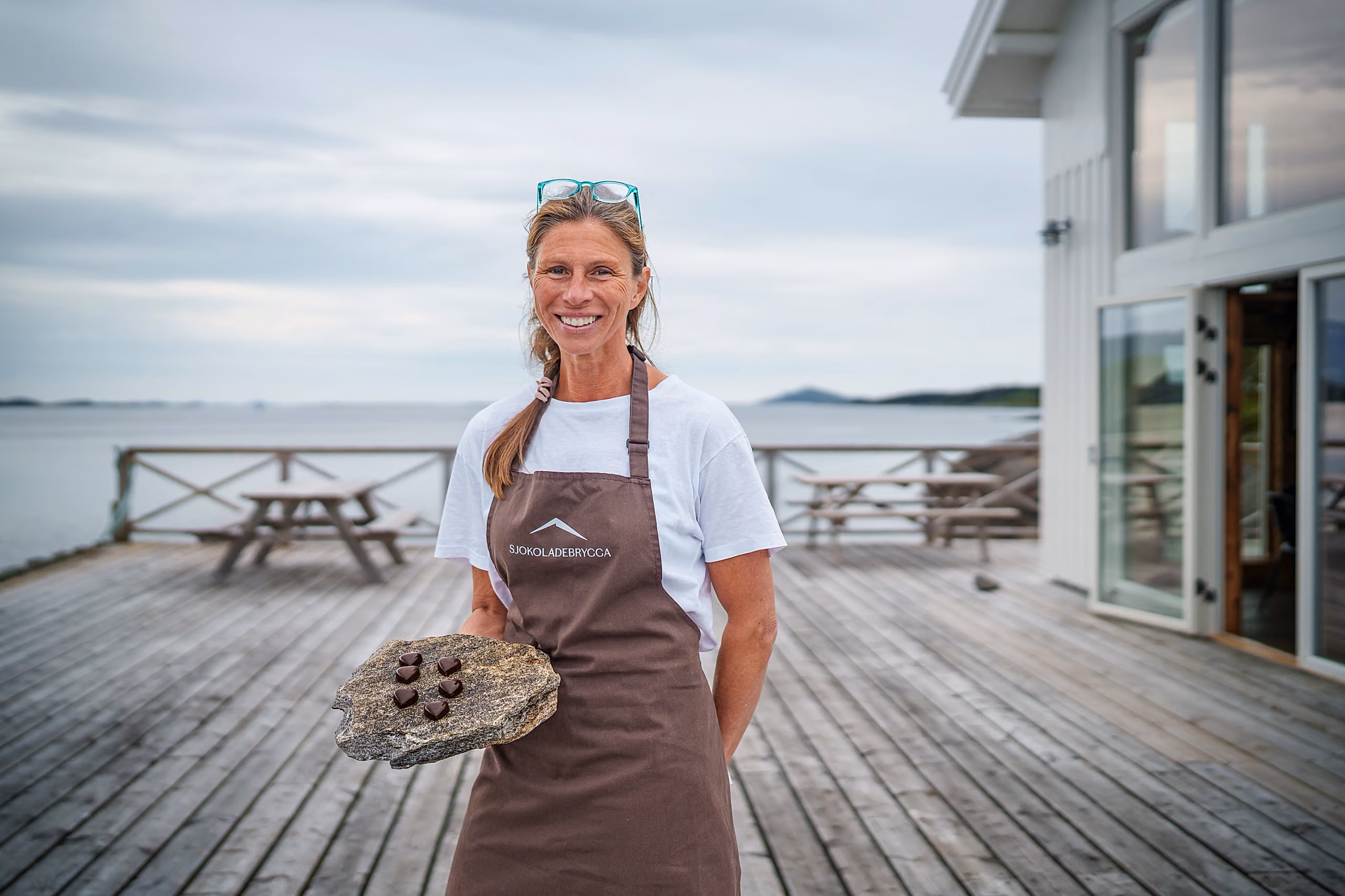 A woman at Sjokoladebrygga chocolate factory at Dønna in Helgeland