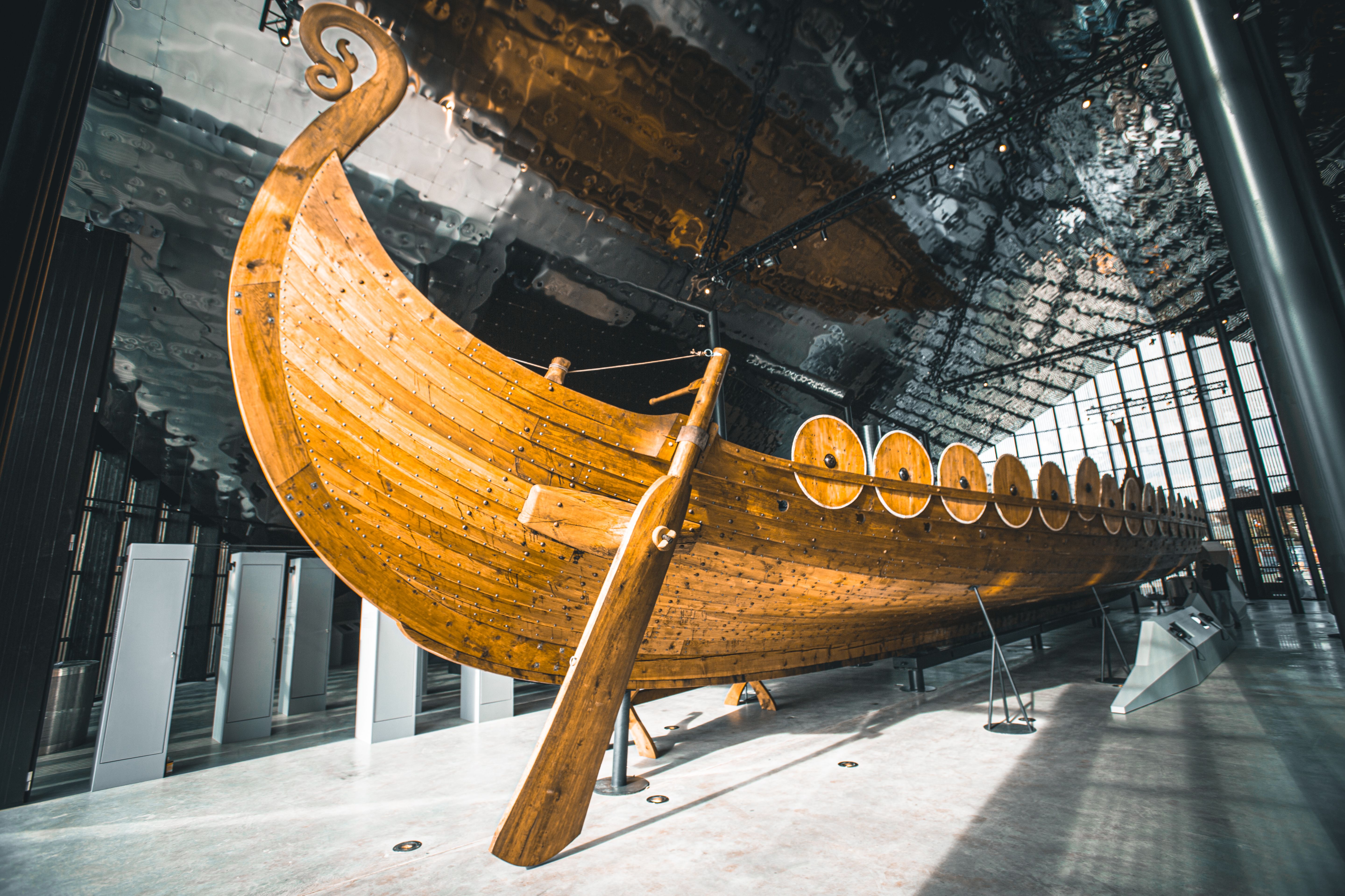 A viking ship in a museum.