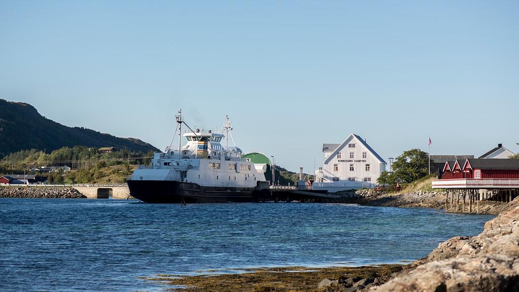 A ferry coming into a port.