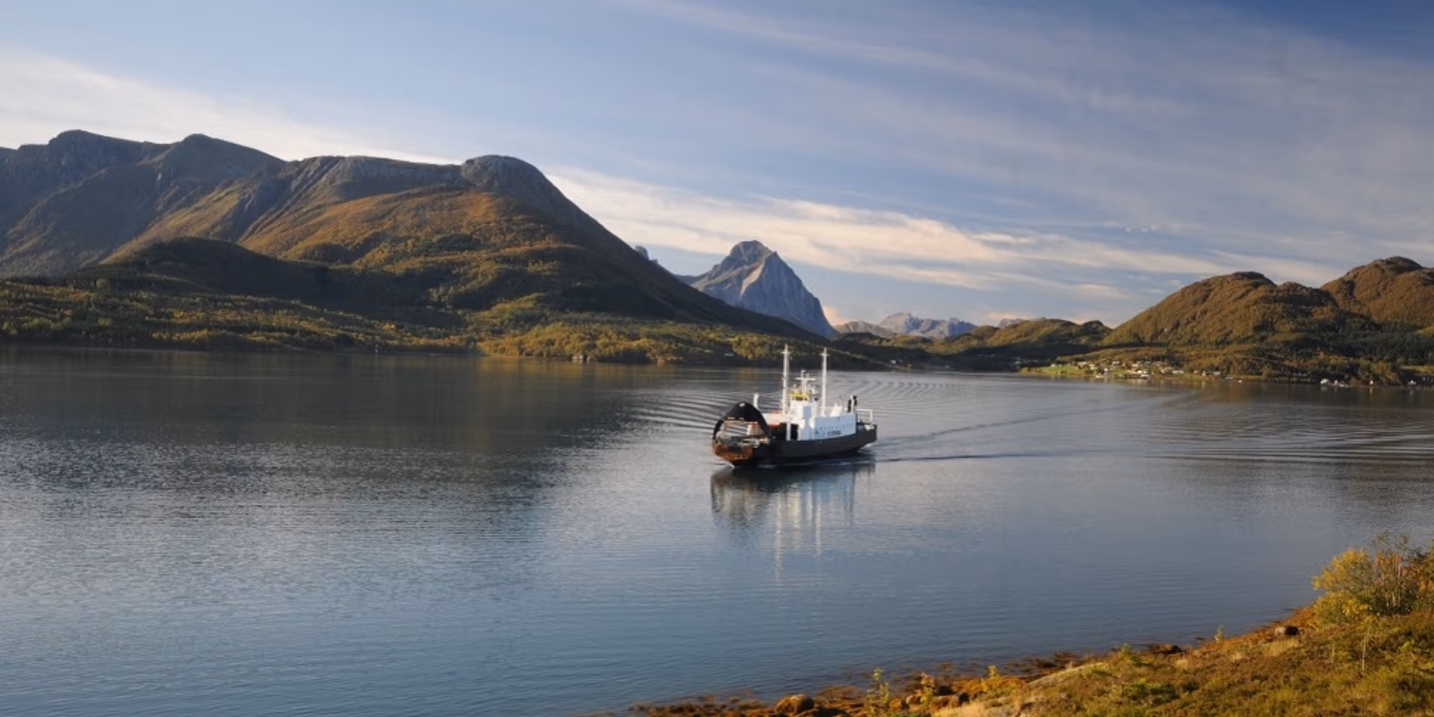 A ferry in the autumn near Kystriksveien in Northern Norway