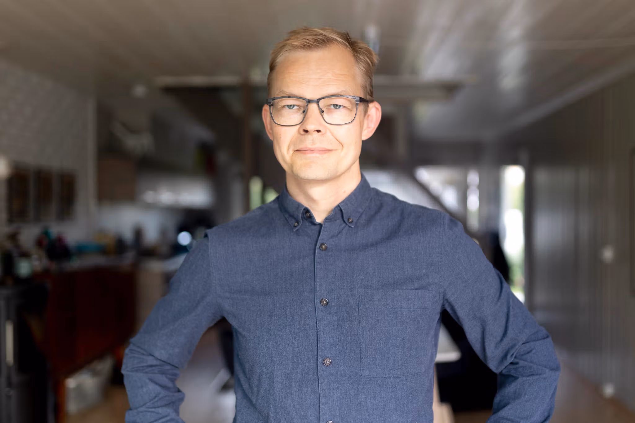 Sami director with glasses