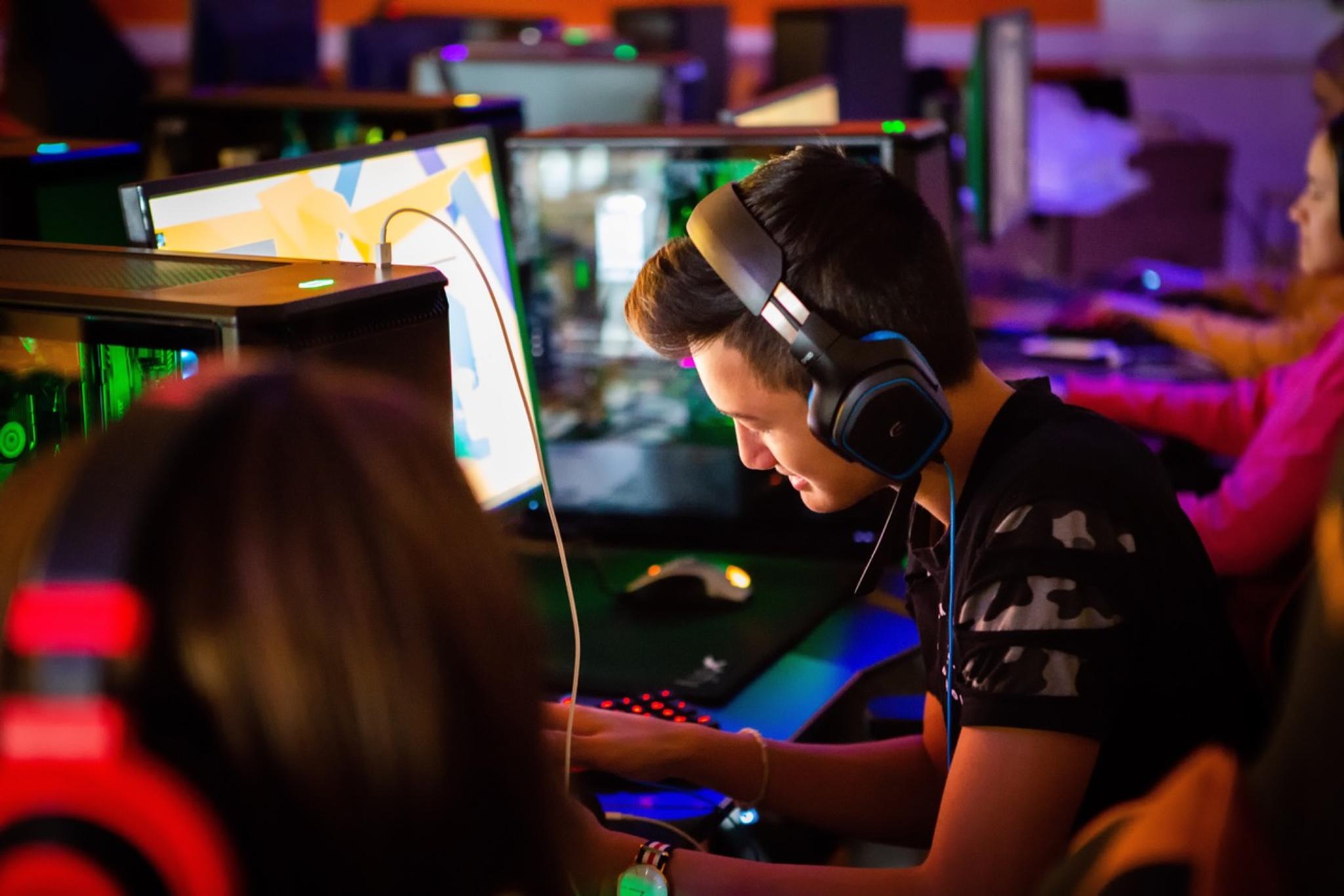 A boy sitting on his computer at the Esport school, Akademiet