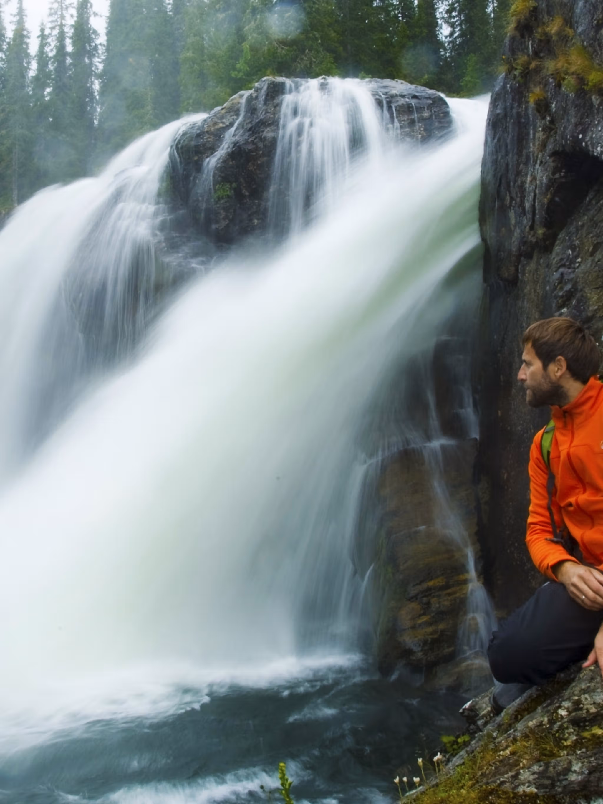 A man next to Rjukandefossen waterfall in Hemsedal, Eastern Norway