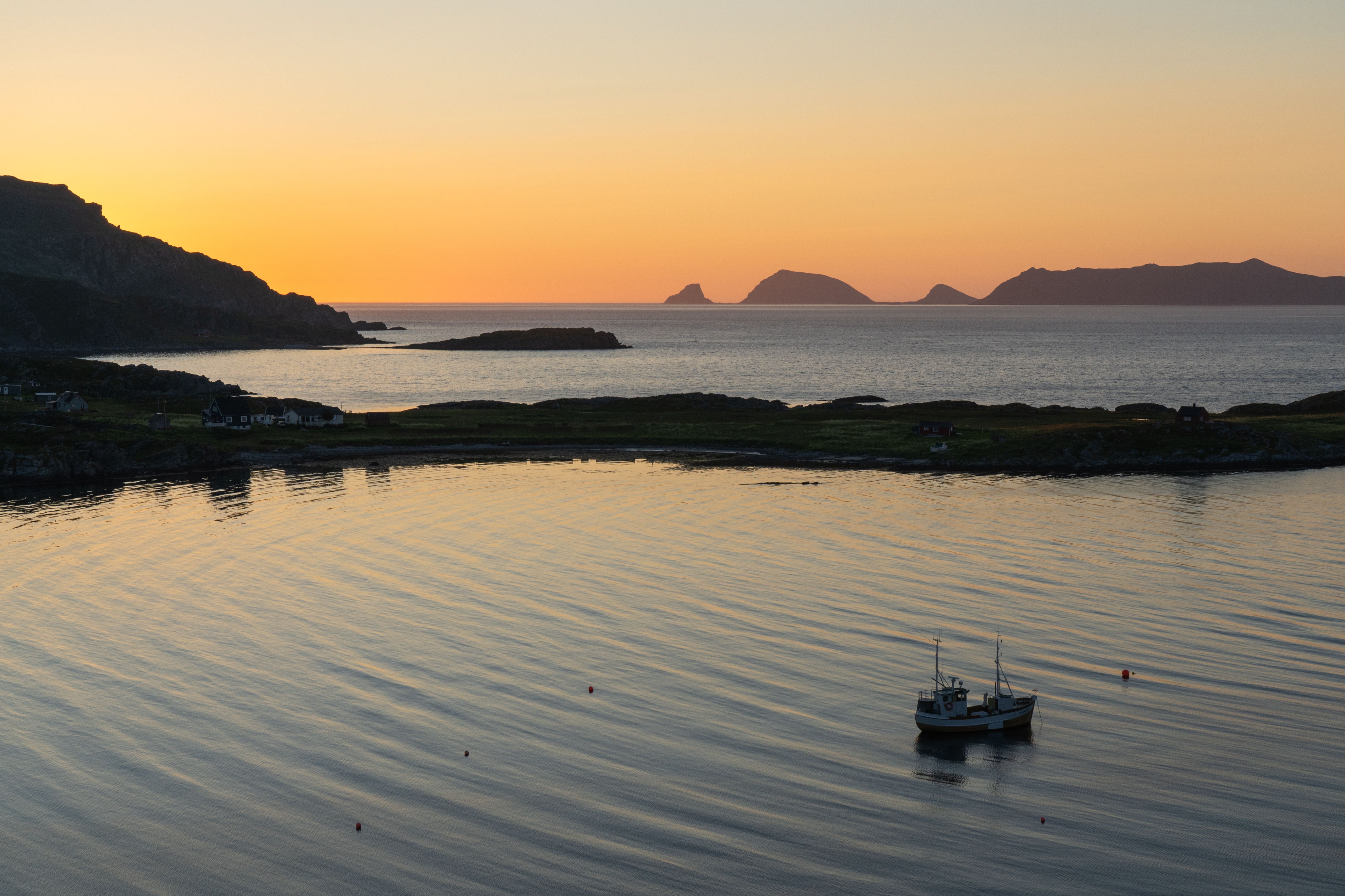 View from Østervågen on Måsøy towards Gjesværstappan under the midnight sun