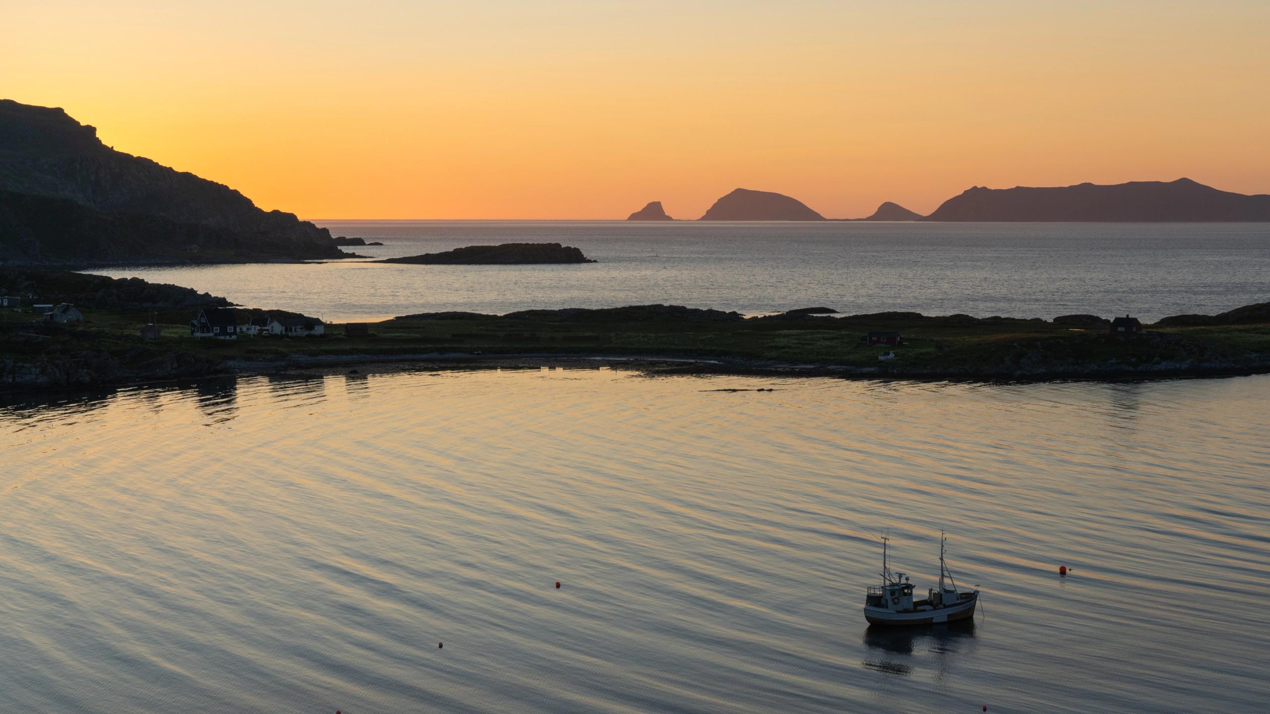 View from Østervågen on Måsøy towards Gjesværstappan under the midnight sun