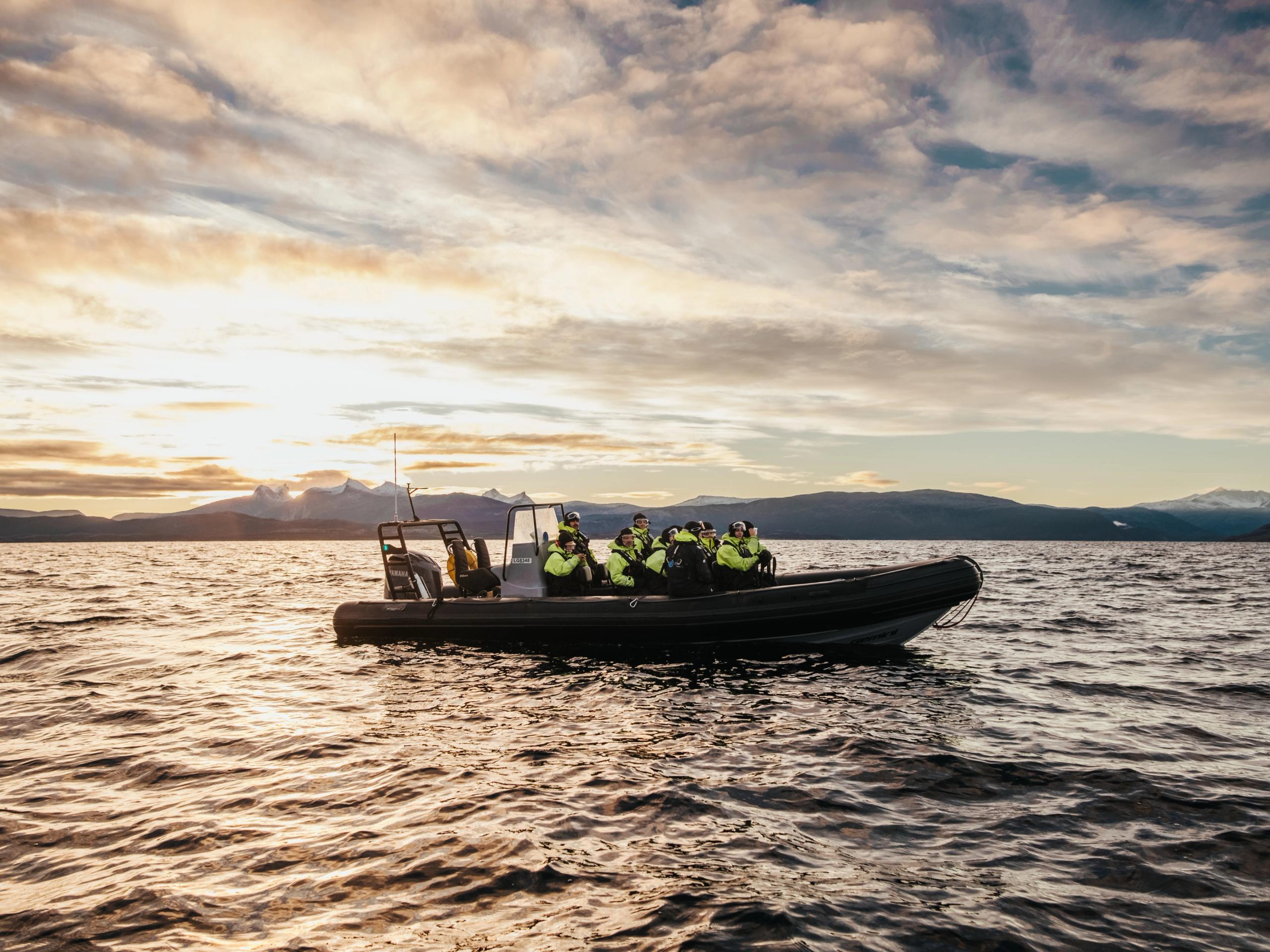 People in a RIB boat in Northern Norway