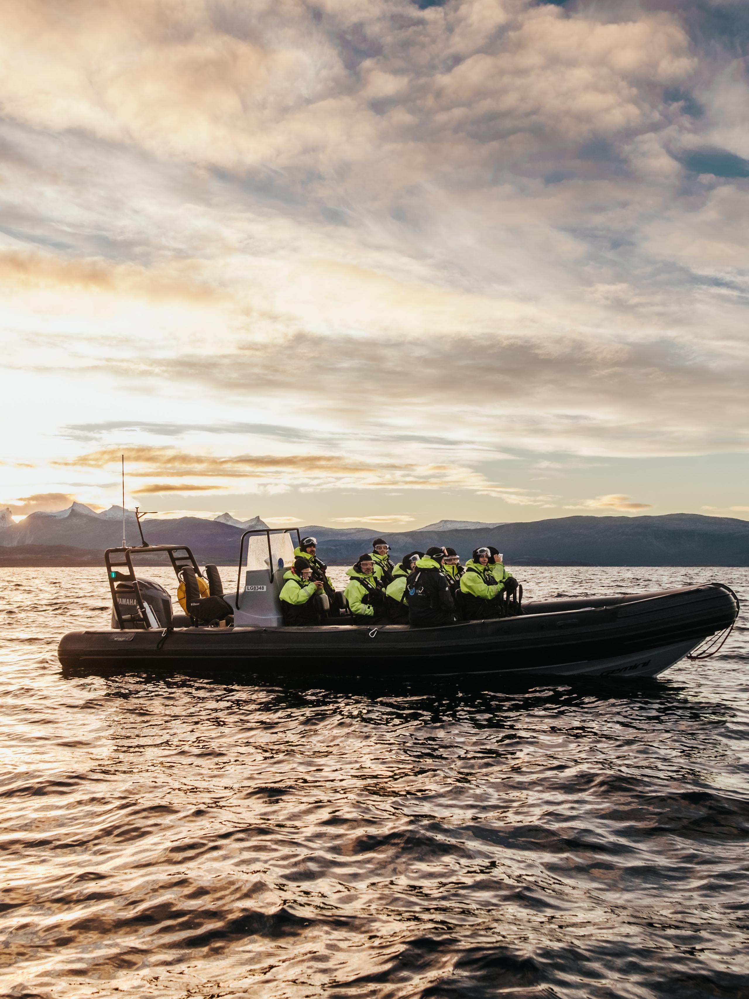 People in a RIB boat in Northern Norway