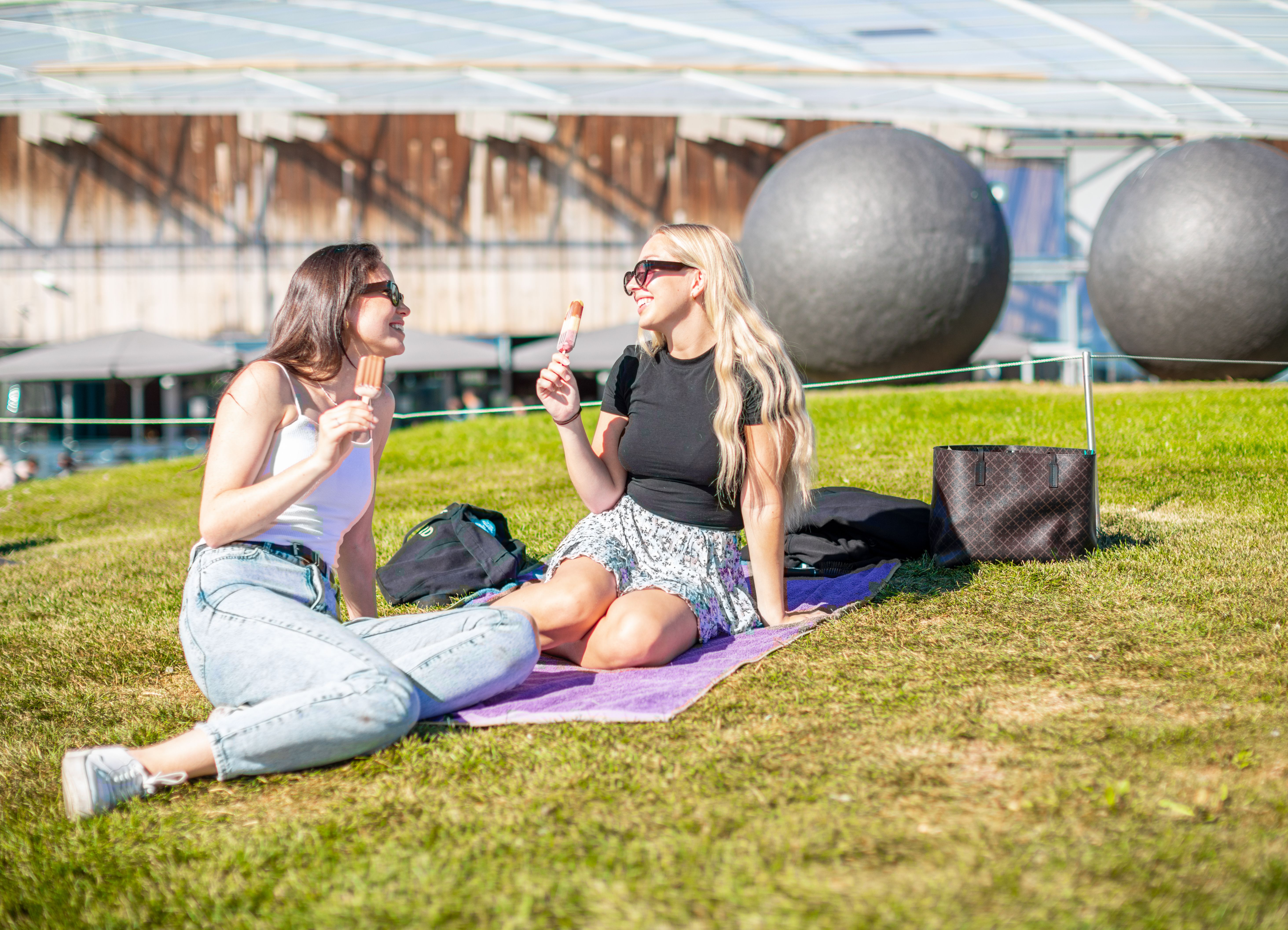 Two girls eating ice cream at Tjuvholmen