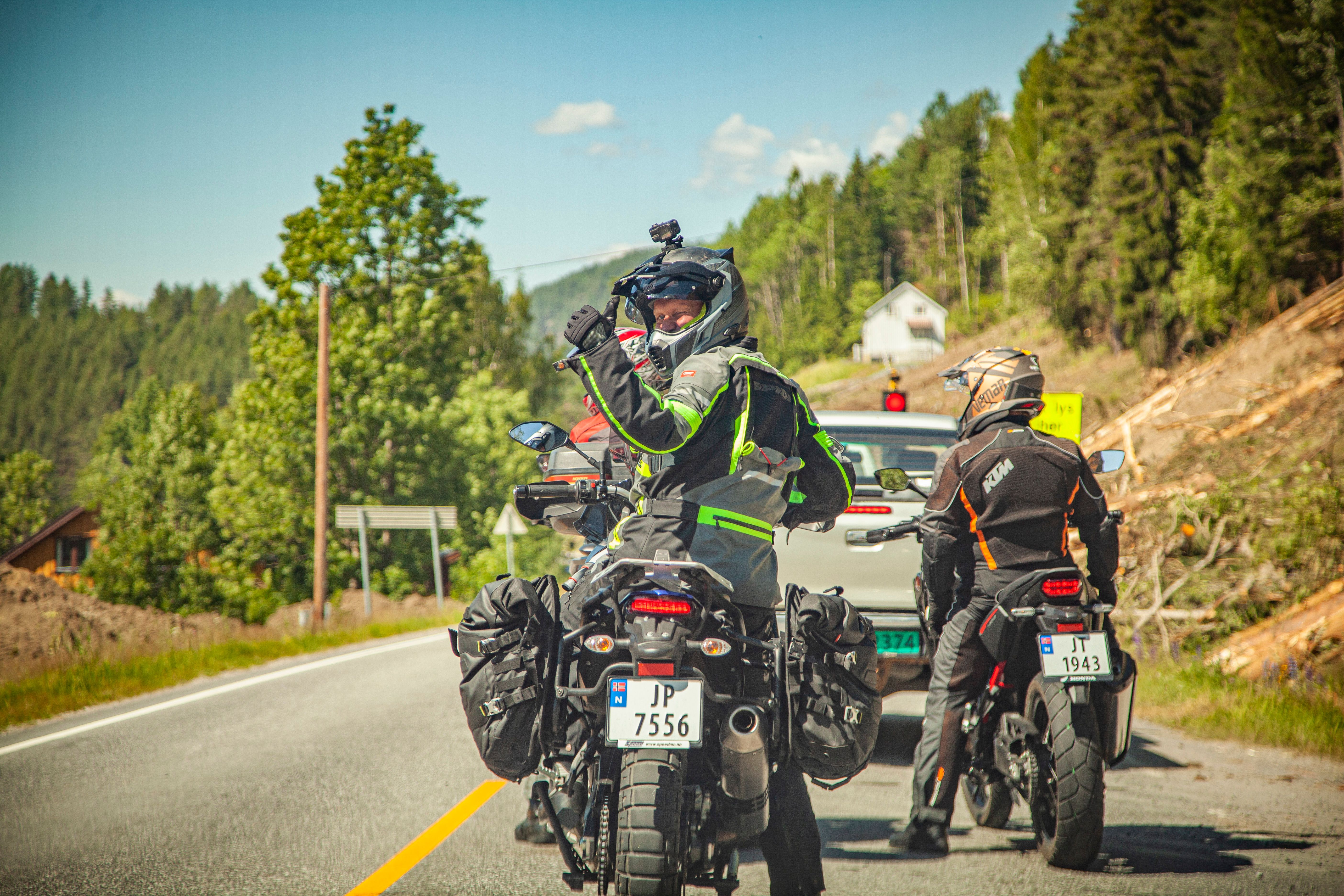 People riding motorcycles