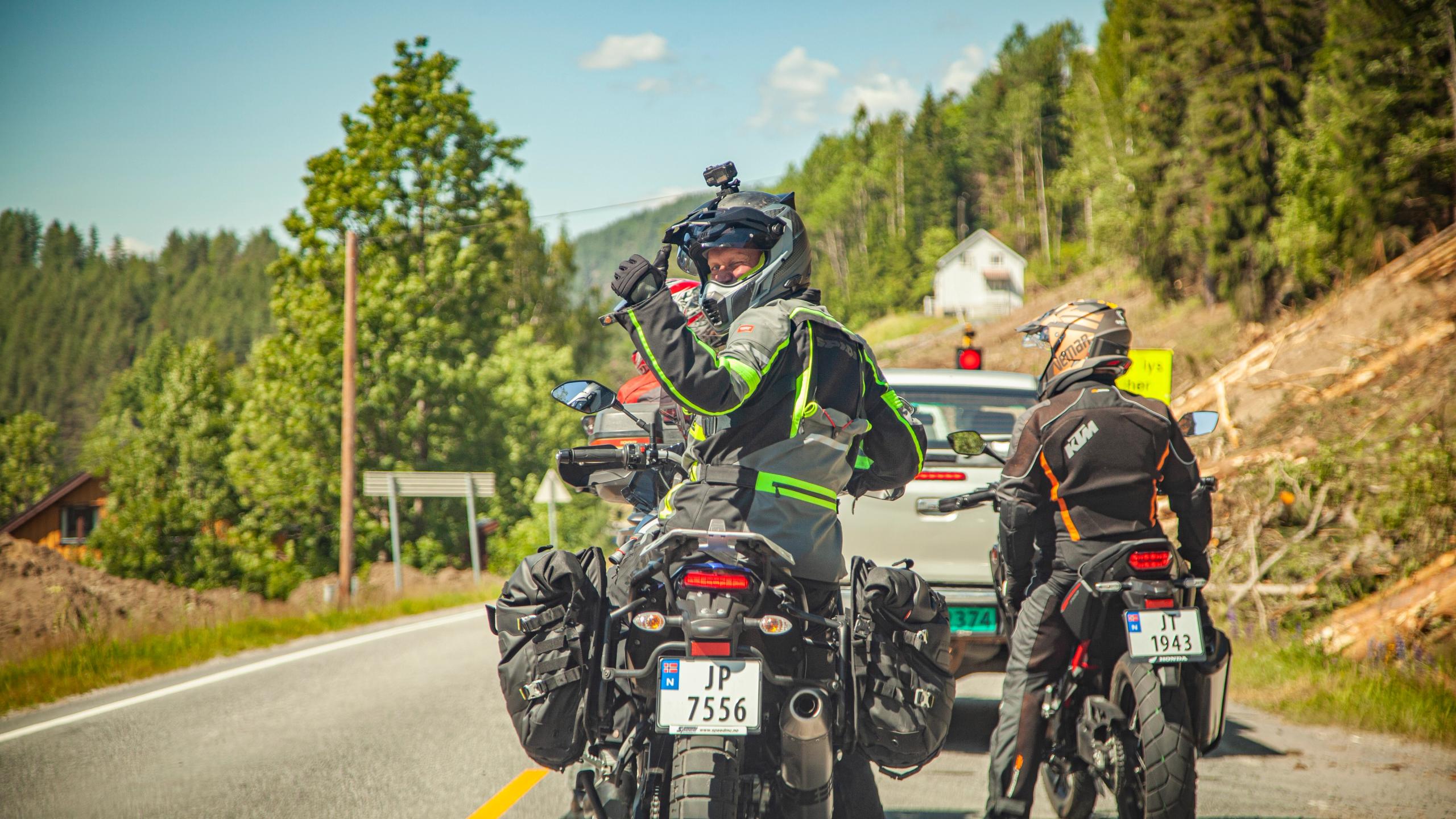 People riding motorcycles