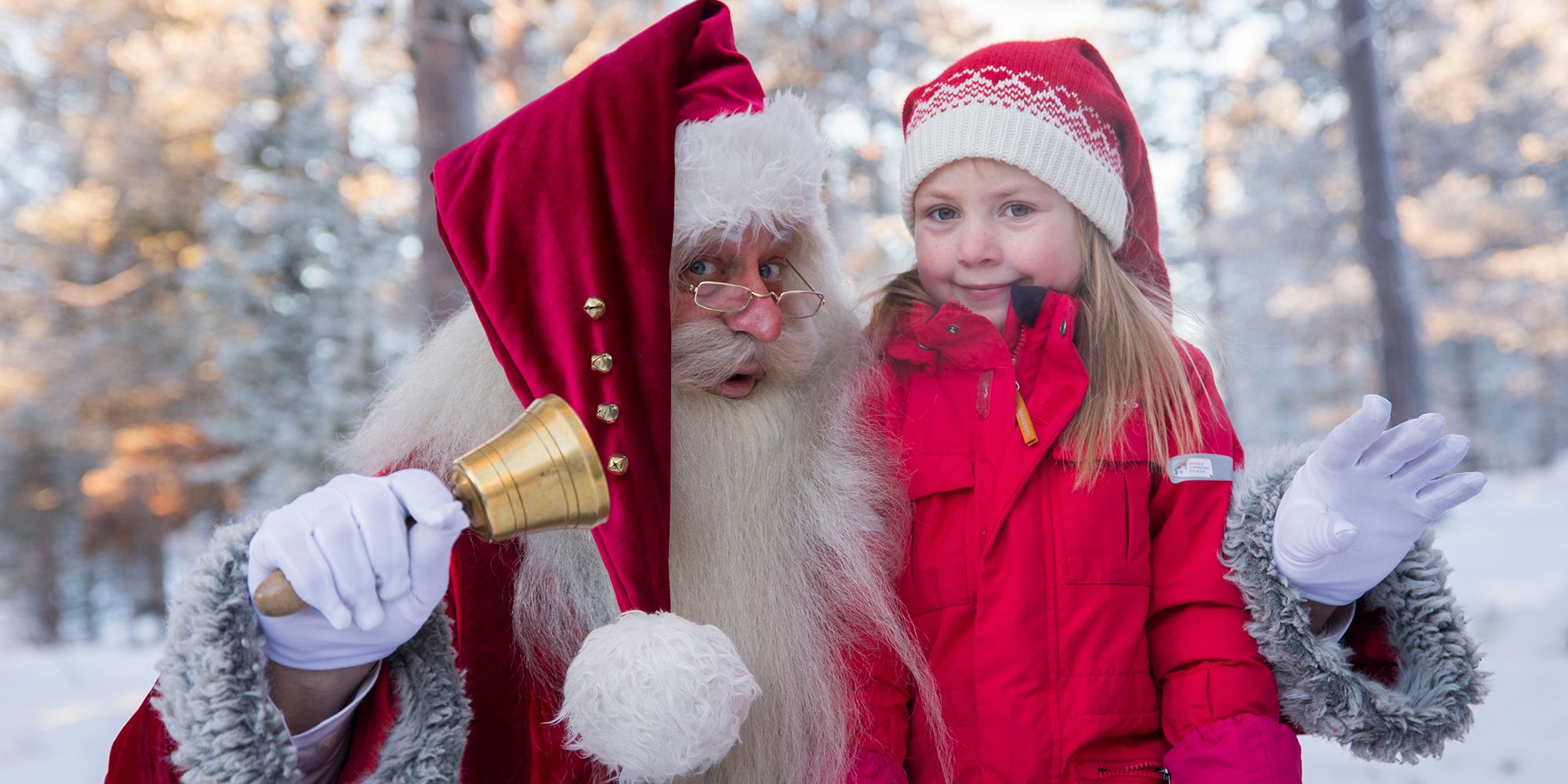 Santa Claus and a girl at one of Norway’s top Christmas destinations, Savalen