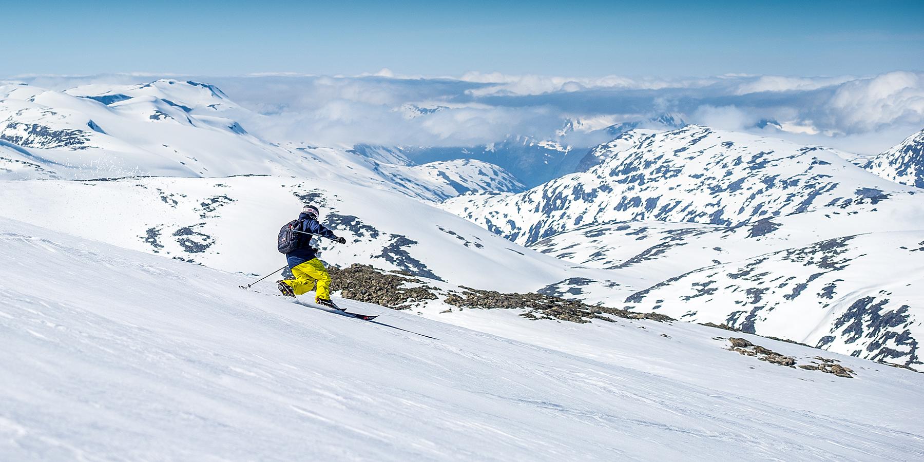 A person is skiing in summer at Stryn Sommerki in Stryn in Nordfjord, Fjord Norway