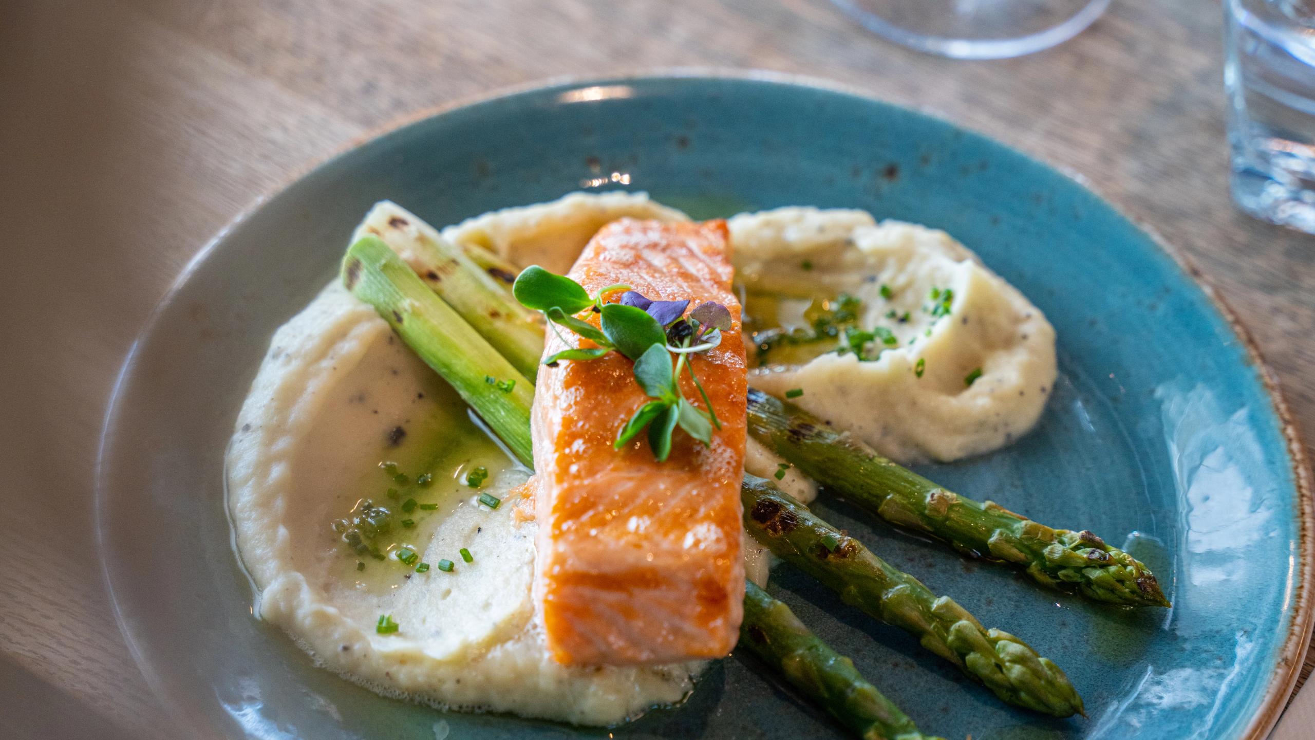 Grilled salmon on a plate at The Salmon, Tjuvholmen in Oslo