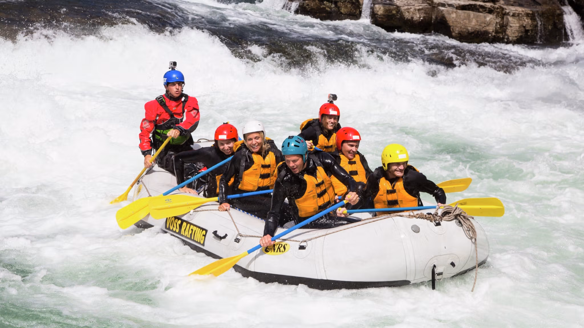 A group of people rafting in Voss