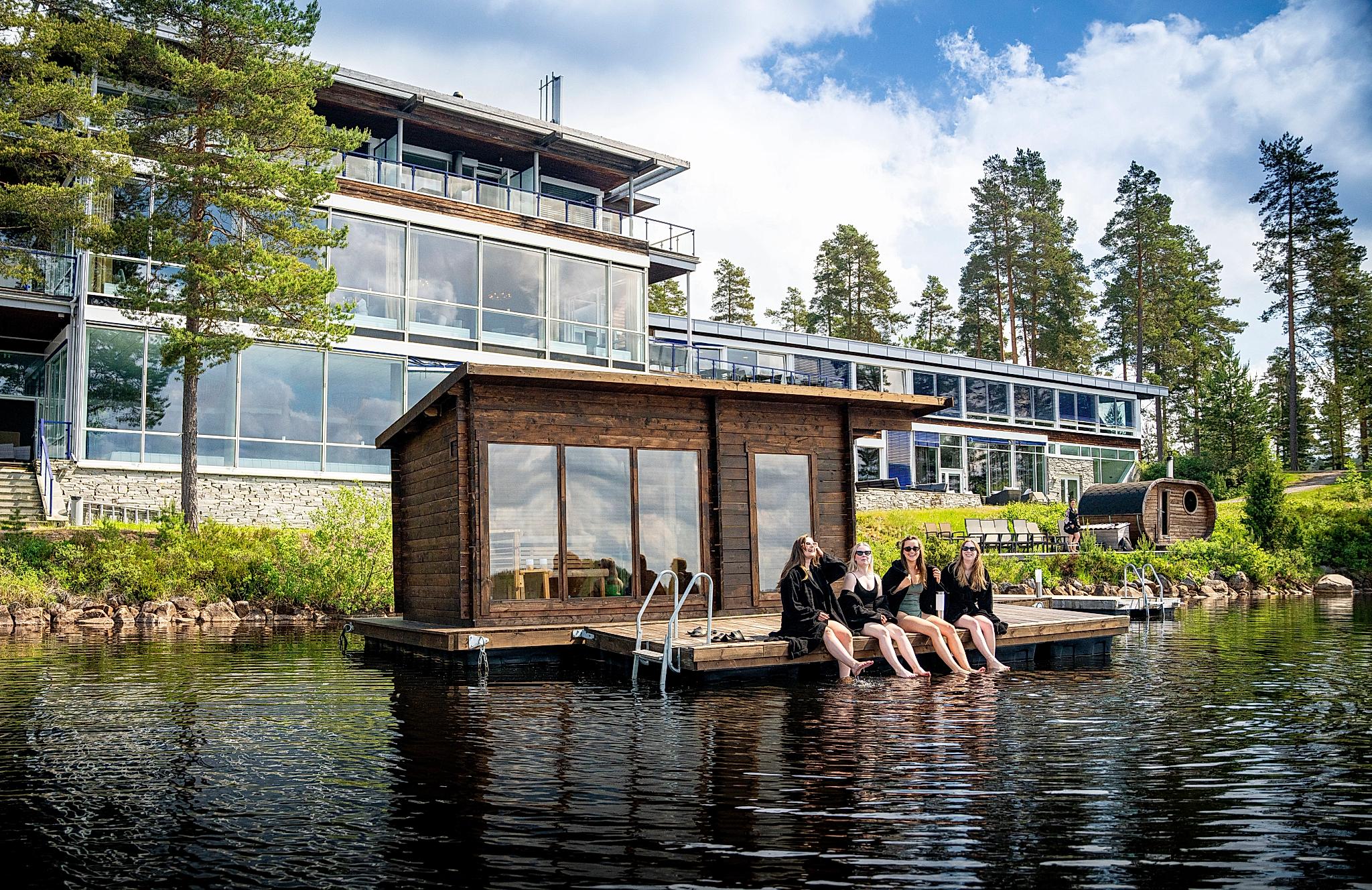 Women enjoying the floating sauna at Rømskog Spa & Resort
